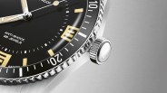 a closeup of a retro oris dive watch