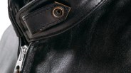 the throat latch on a Schott cafe racer black leather jacket