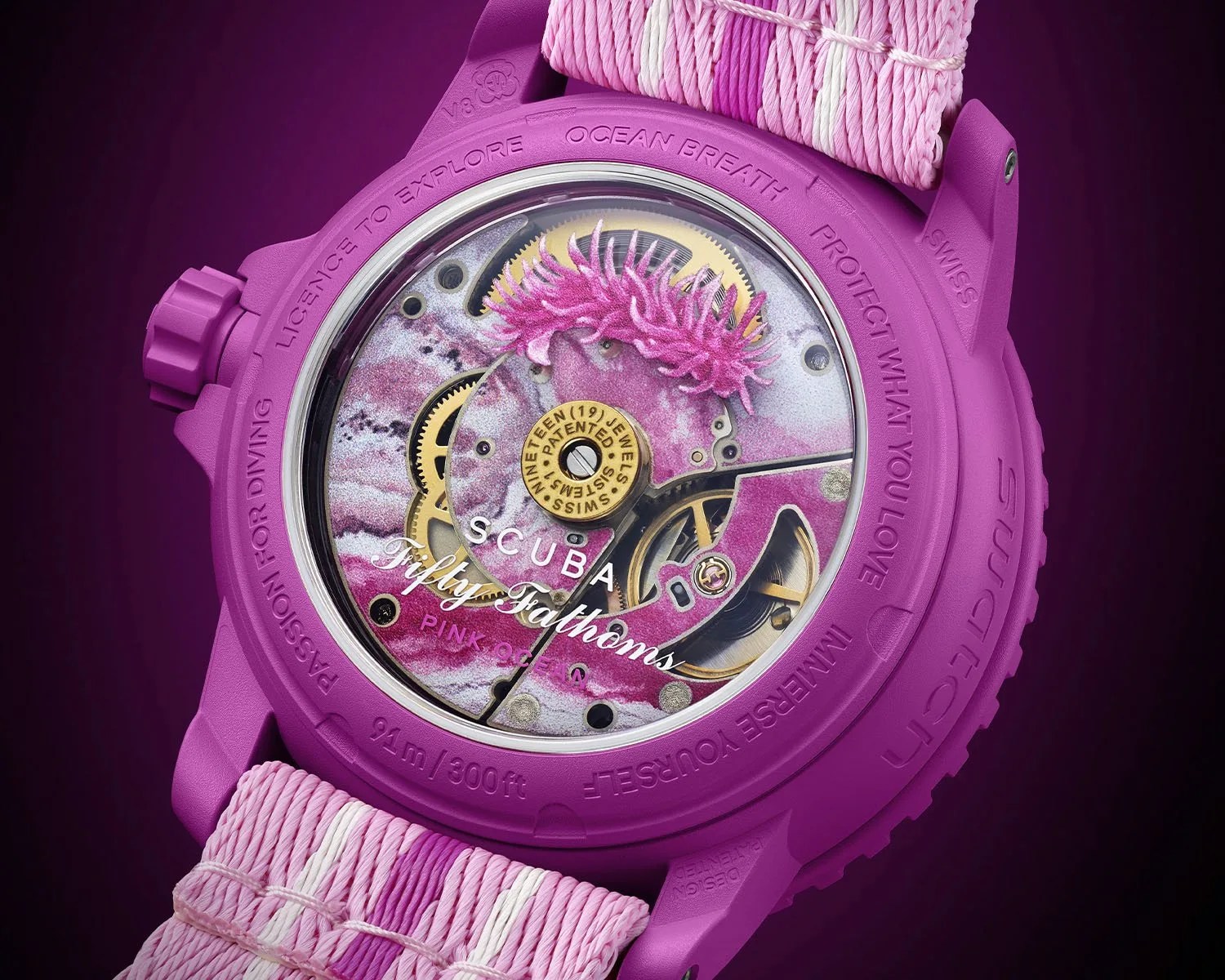 the case back of a pink watch