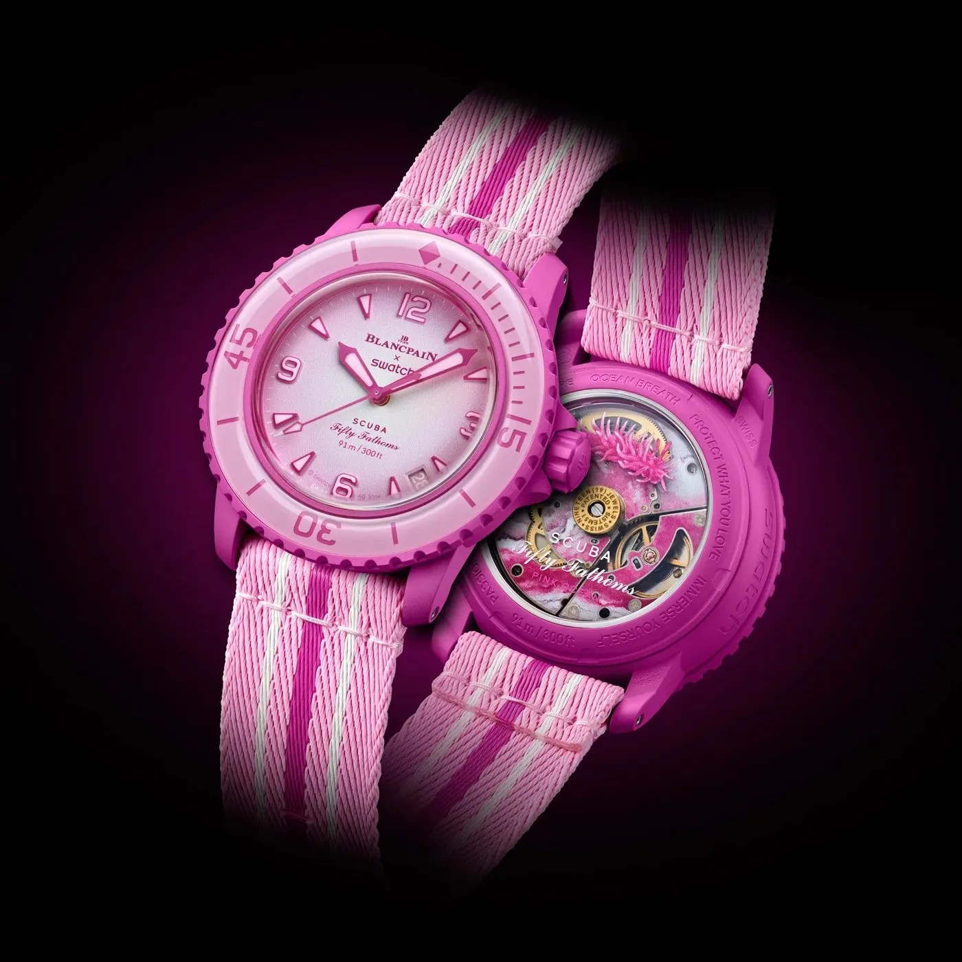the front and back of a pink watch