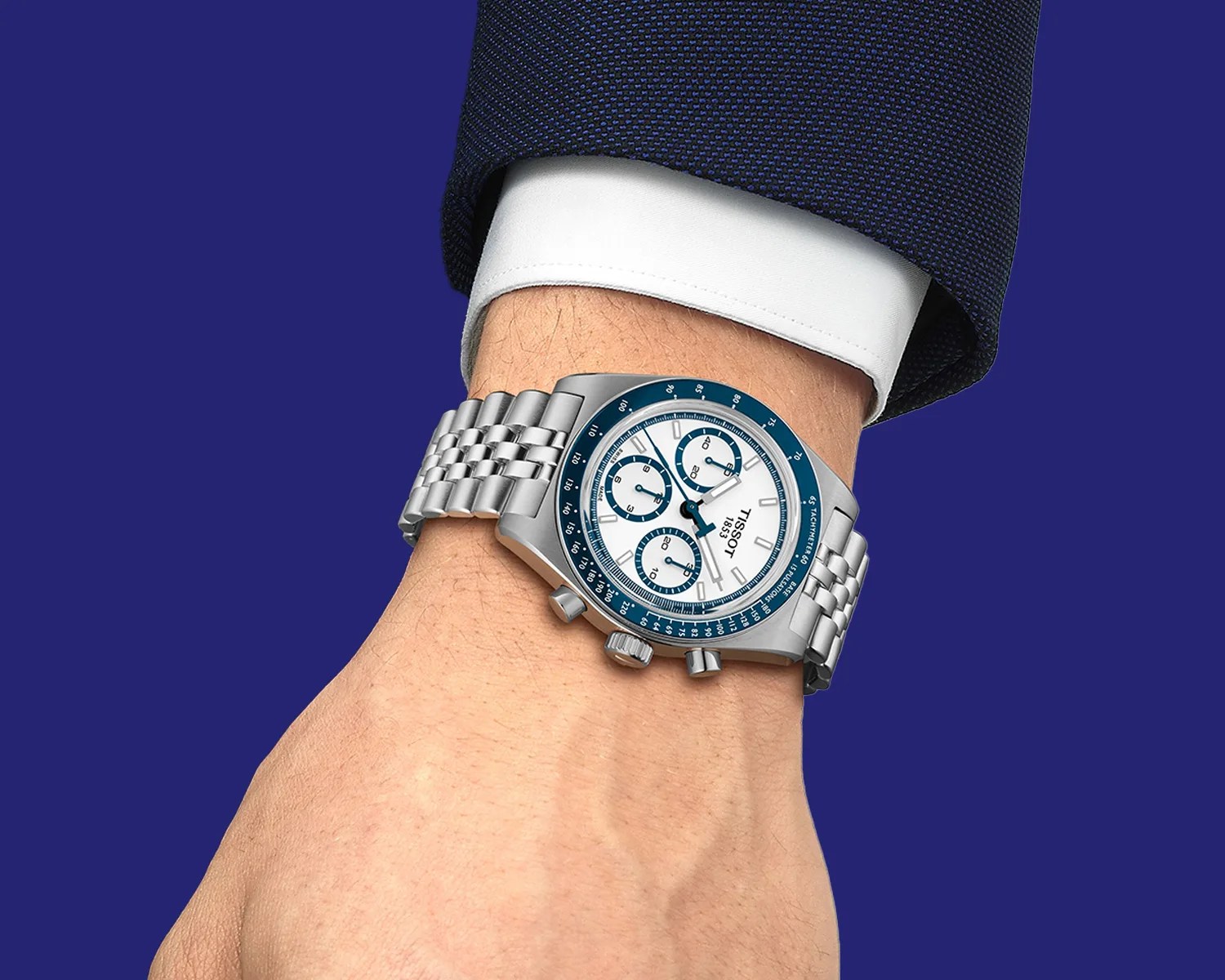 a tissot chronograph watch on a mans wrist