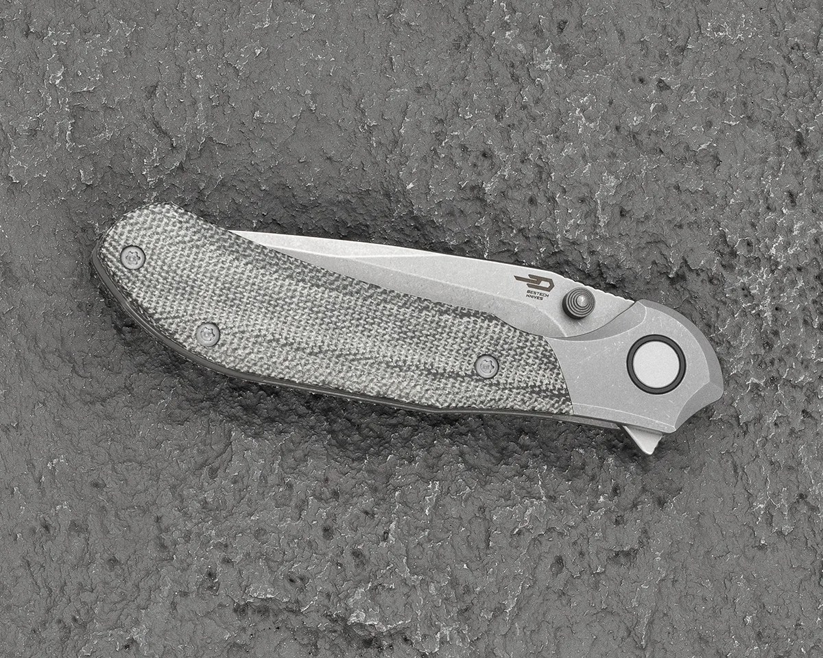 closed Bestech Constellation knife on stone background