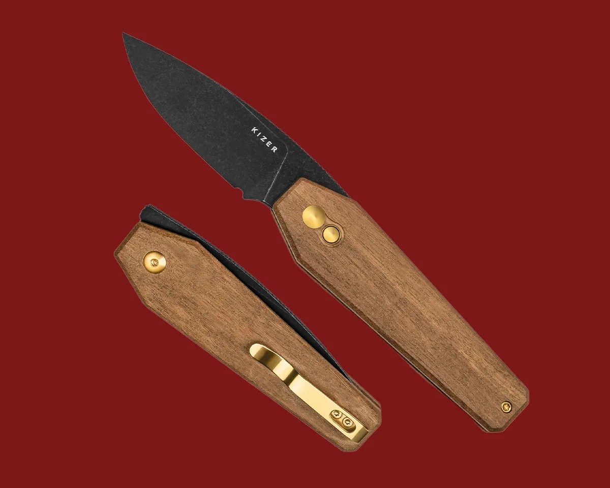 Kizer Tomb knife with wood handle on red background