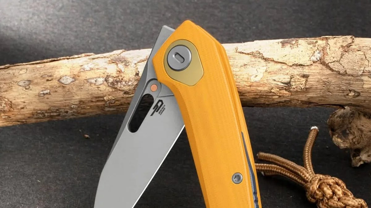 Bestech VK-Void G10 Knife on gray felt in front of tree branch