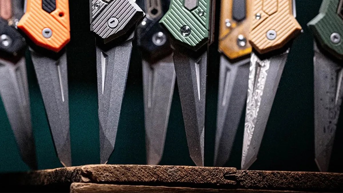 Multiple Pichi Design Kameta knives stuck in wood table