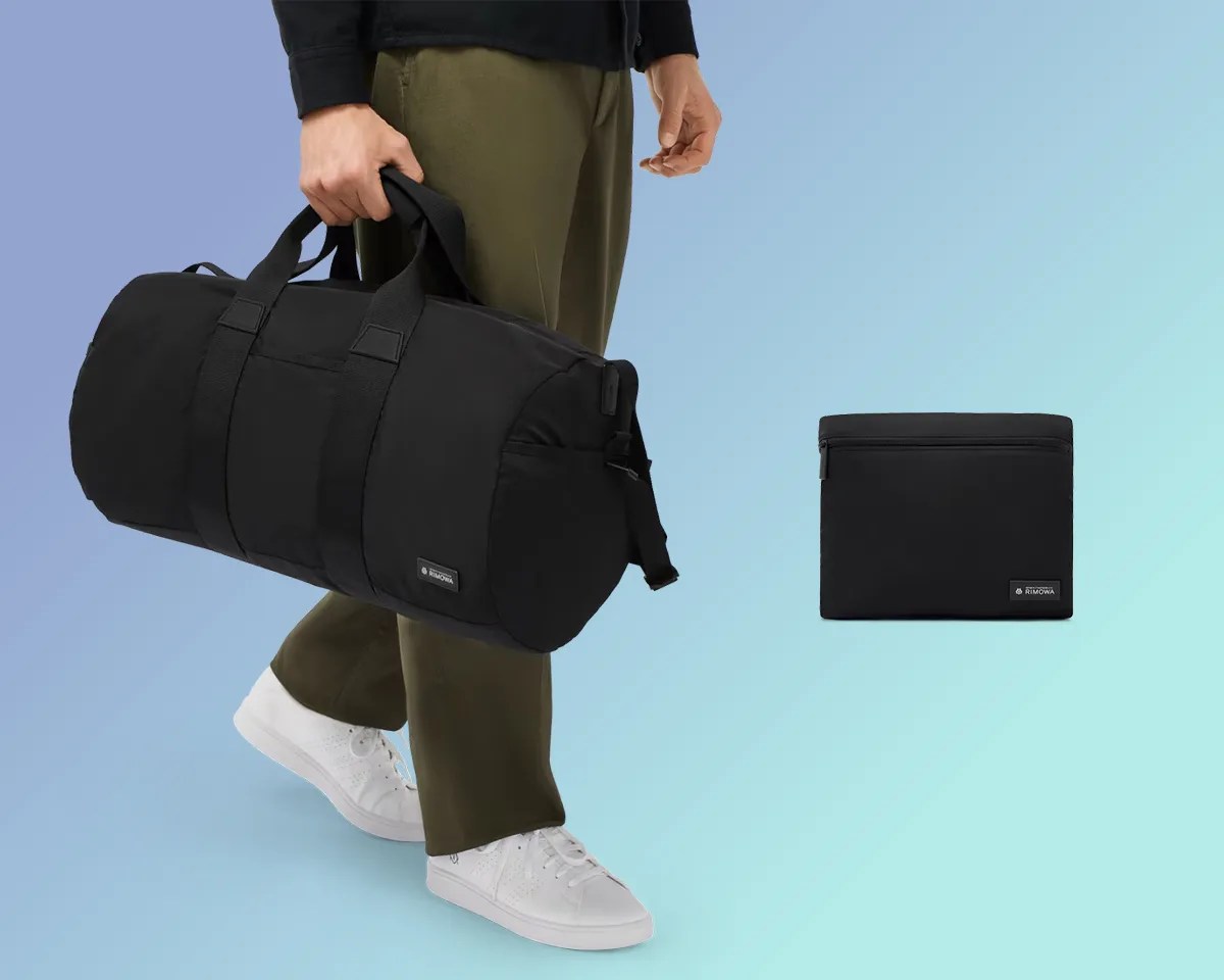 Rimowa foldable gym bag on blue background