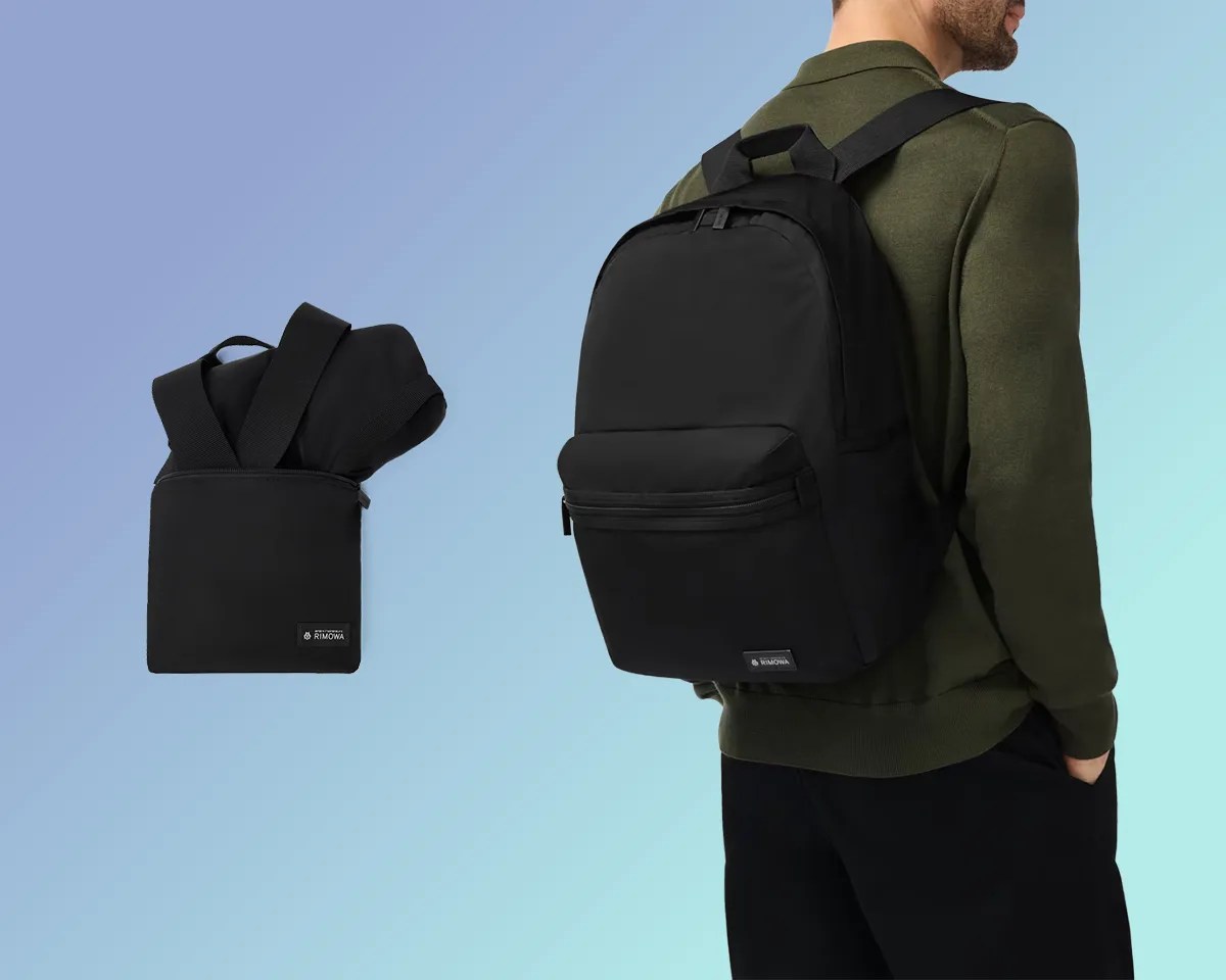 Rimowa foldable backpack on blue background