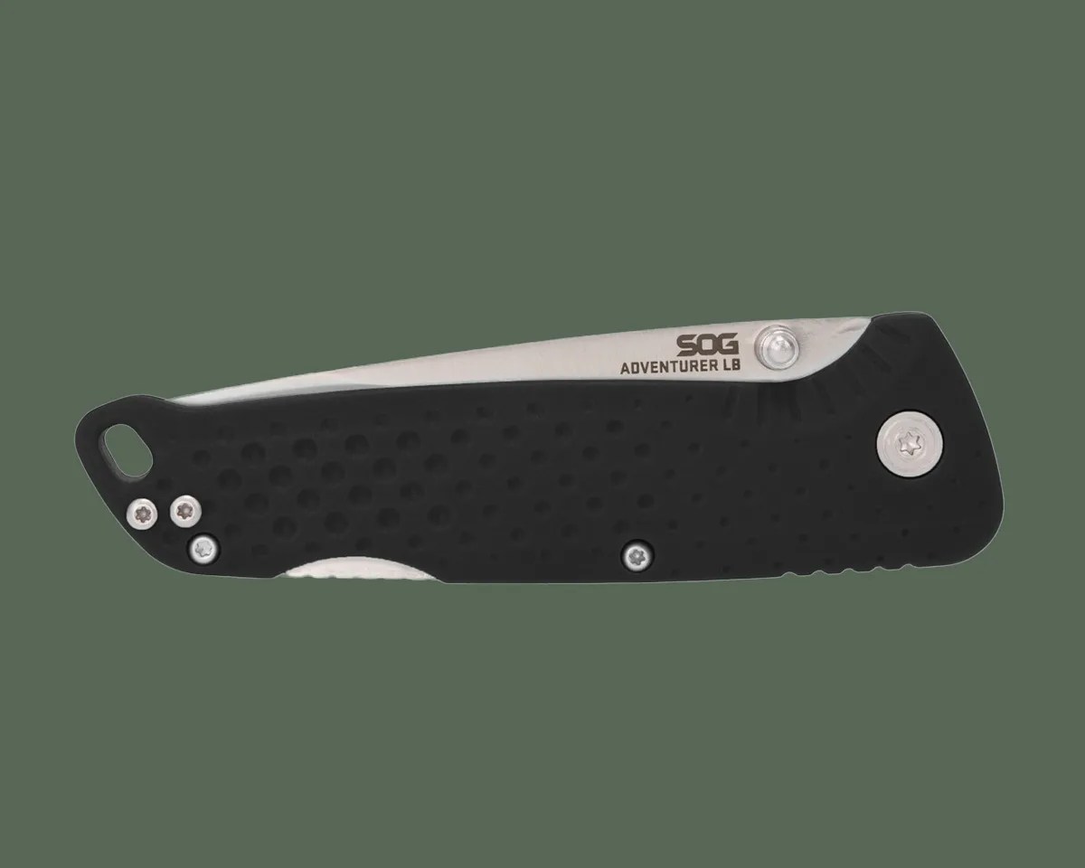 SOG Adventurer LB knife closed on green background