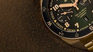 a closeup of a bronze bremont tool watch