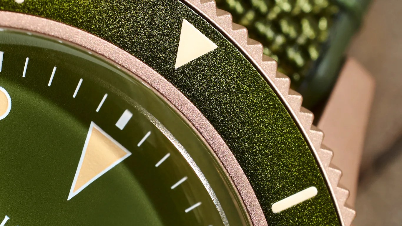a closeup of a bulova military dive watch bezel