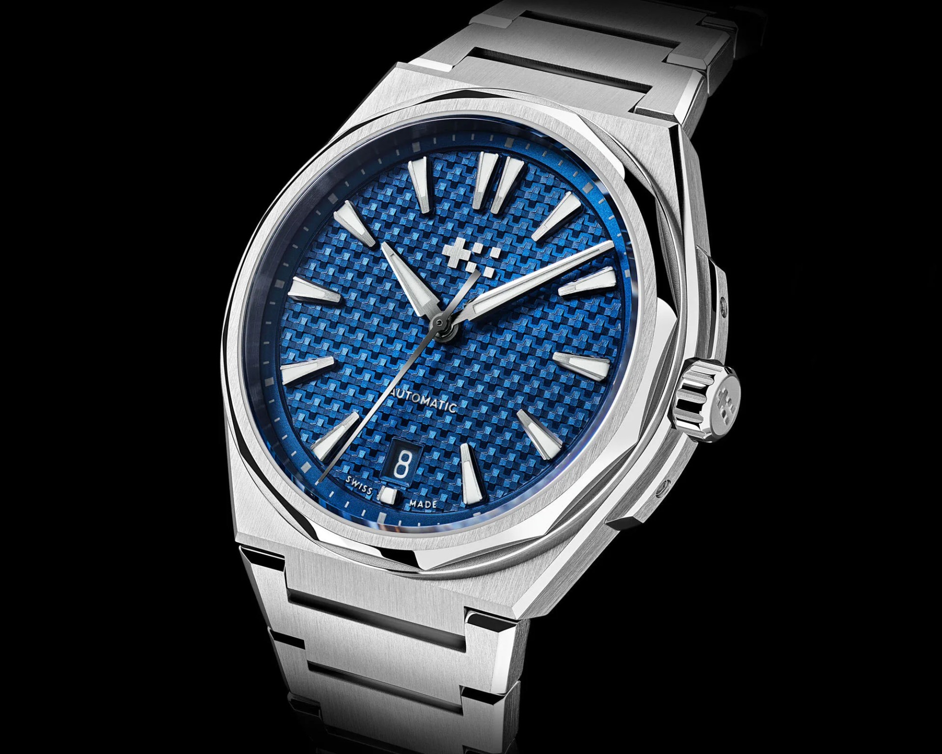 a steel watch with a blue dial