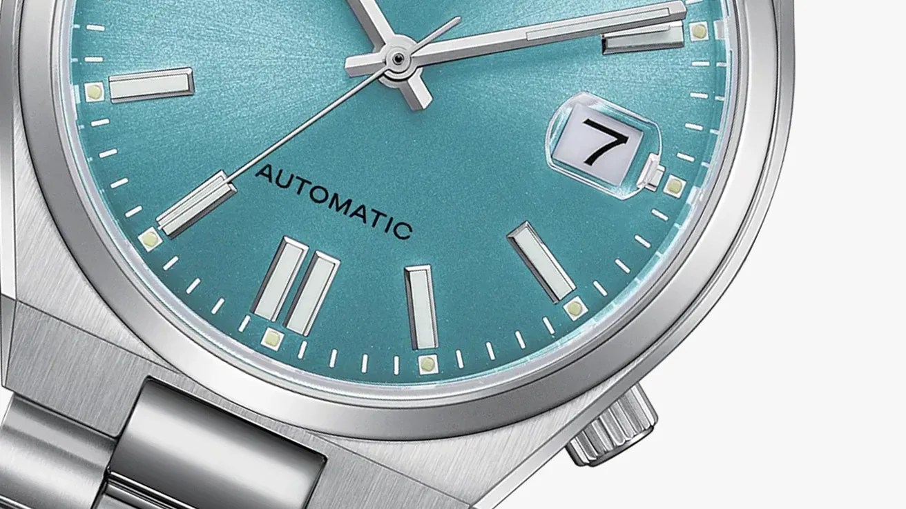 close up view of a steel Citizen 37 millimeter Tsuyosa watch with a blue dial
