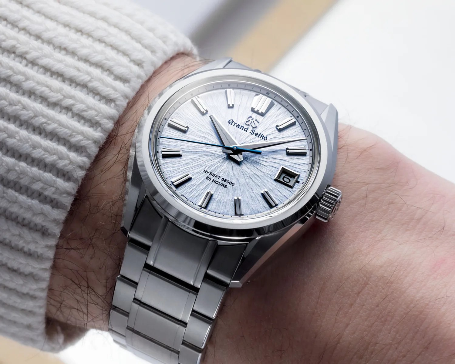 a Grand Seiko watch on a mans wrist