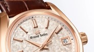 the dial of a gold Grand Seiko watch