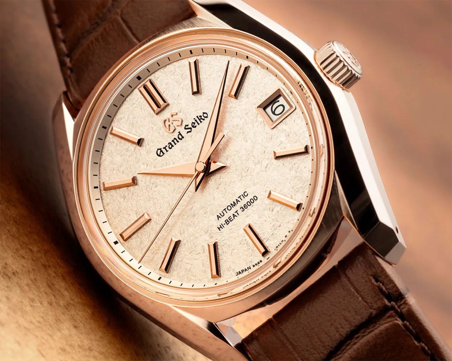 close view of the dial on a gold Grand Seiko watch