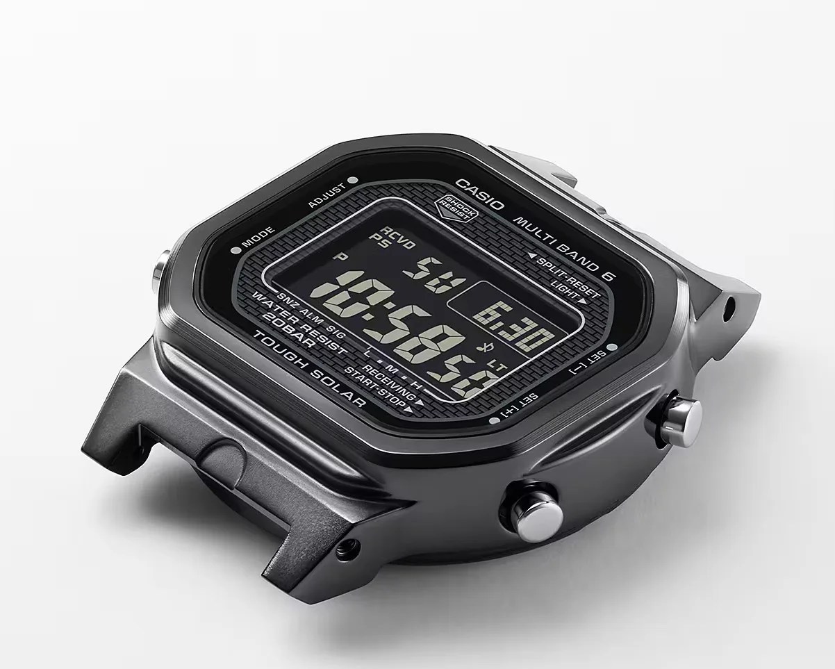 a black digital watch with no band