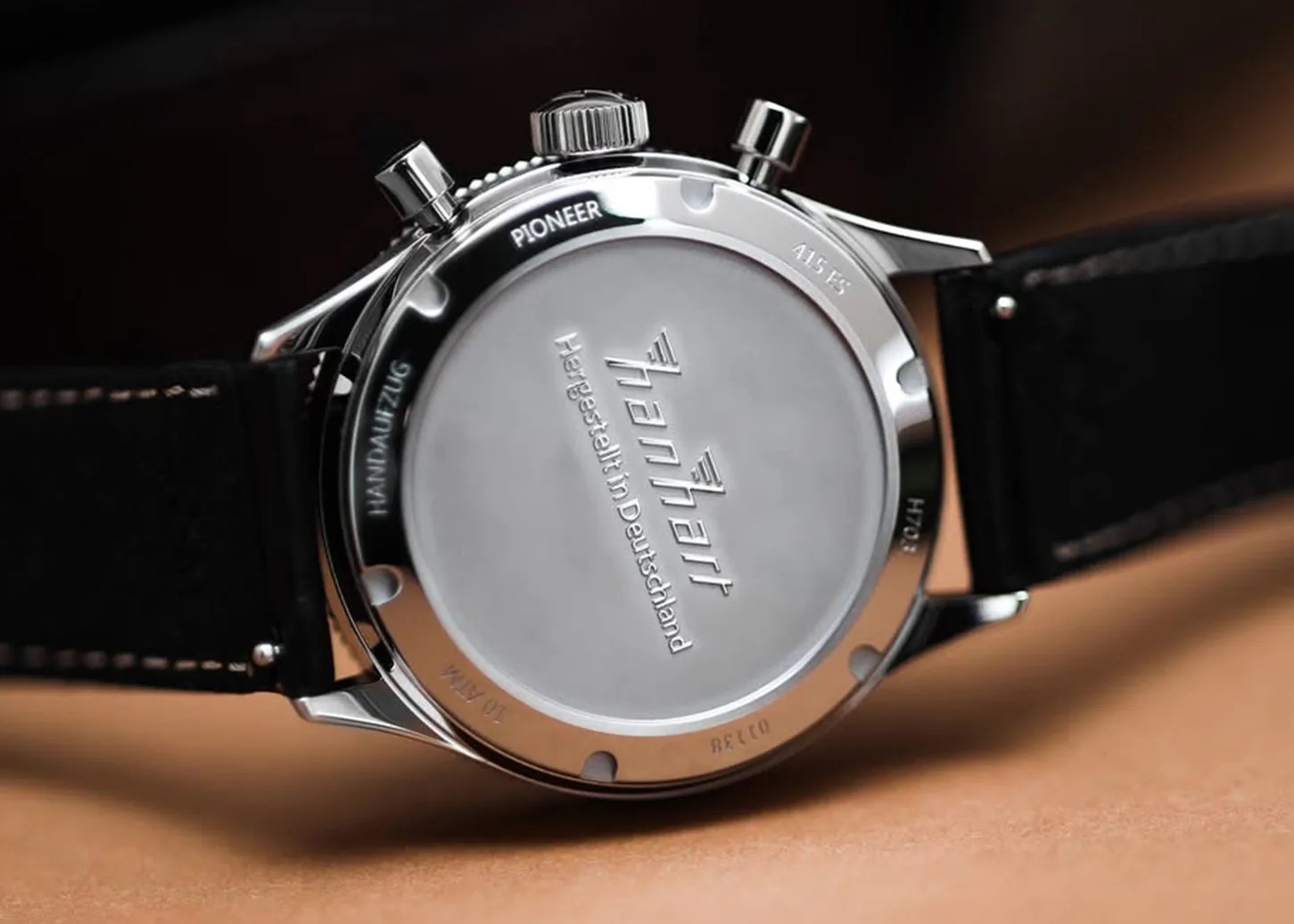 the signed case back of a Hanhart watch