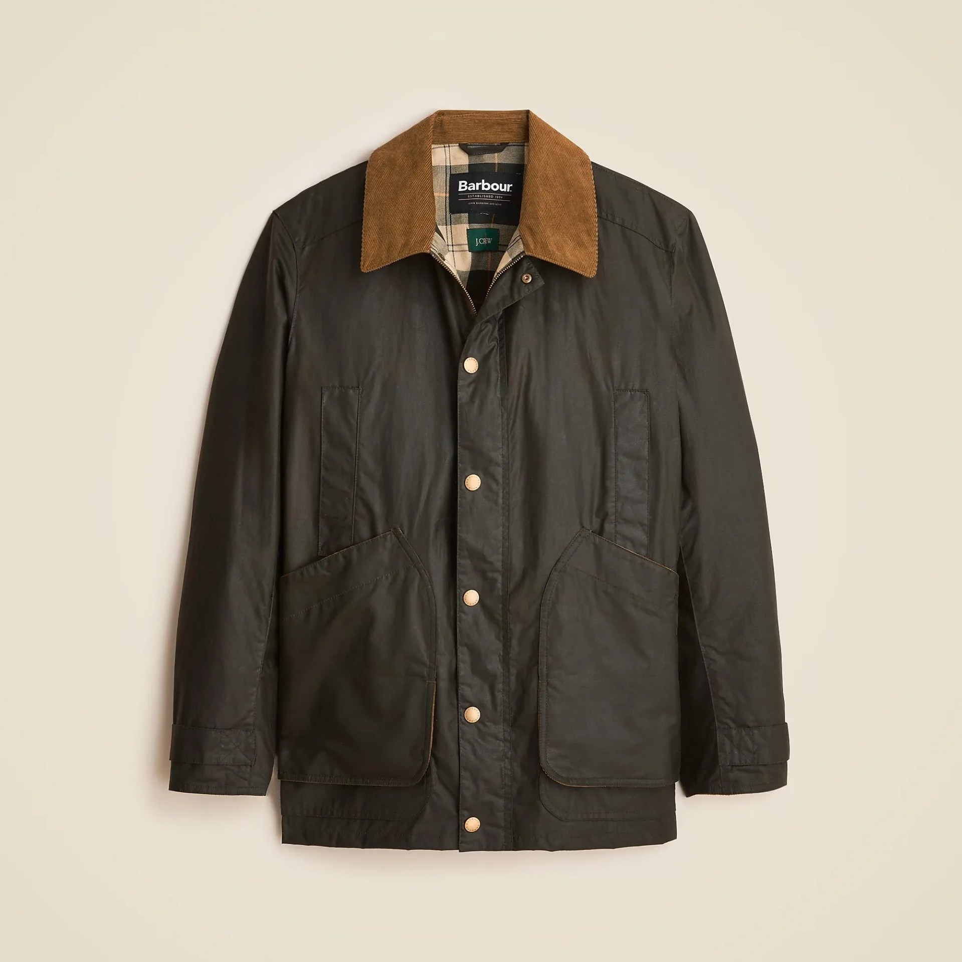 a green J.Crew Barbour barn coat