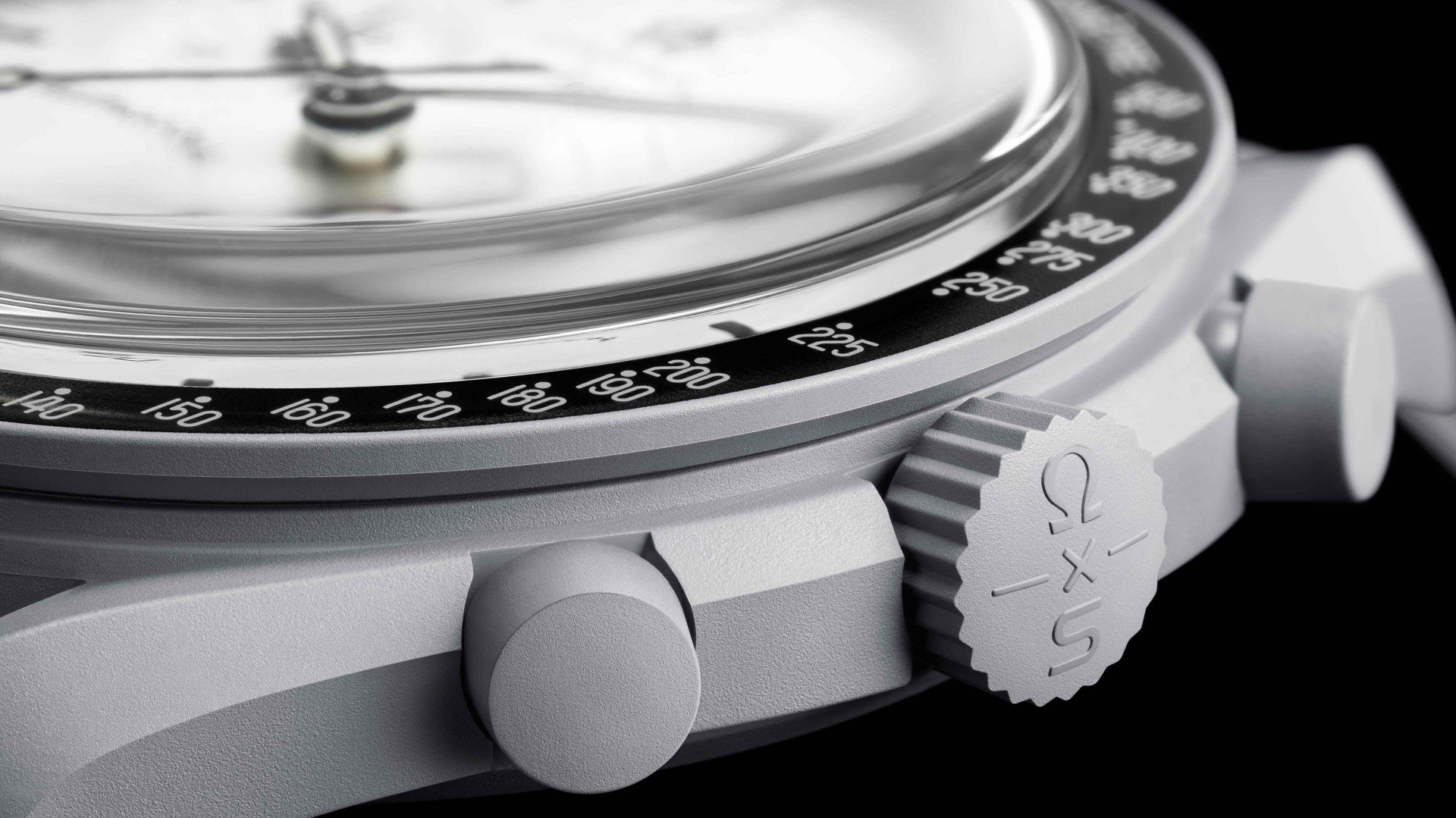 the crown and bezel of a gray watch