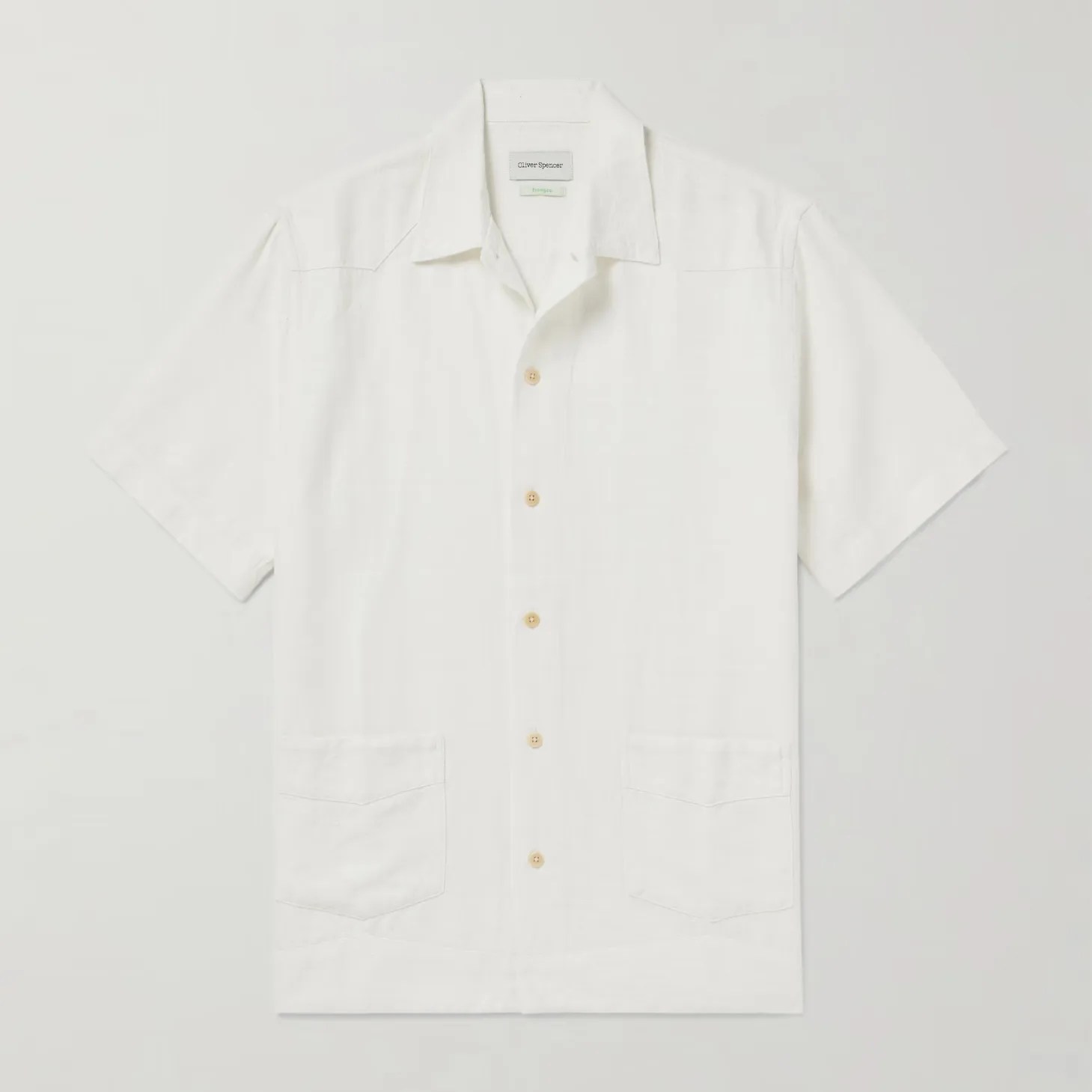 a white linen short sleeve camp collar shirt