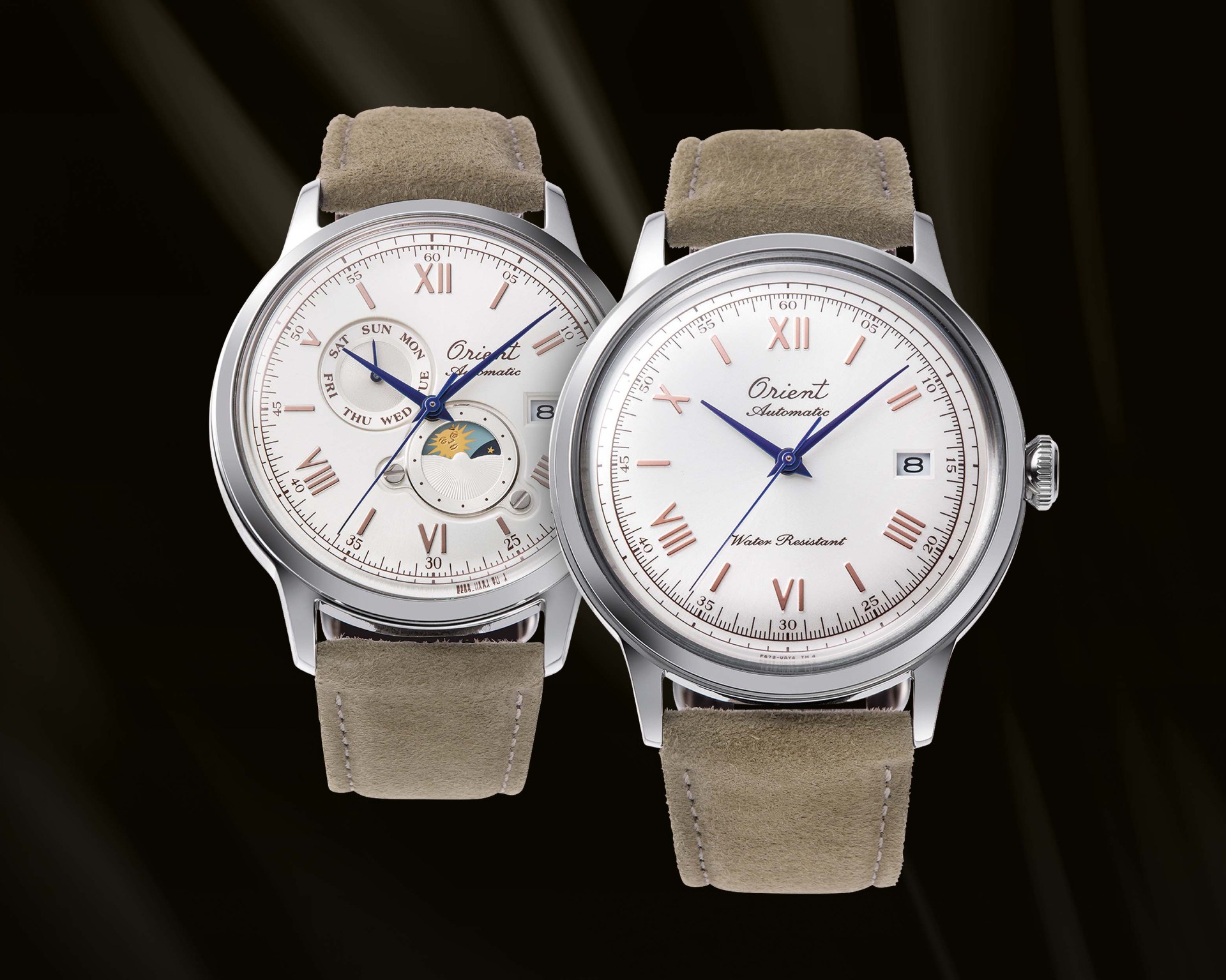 two white dial dress watches with suede straps