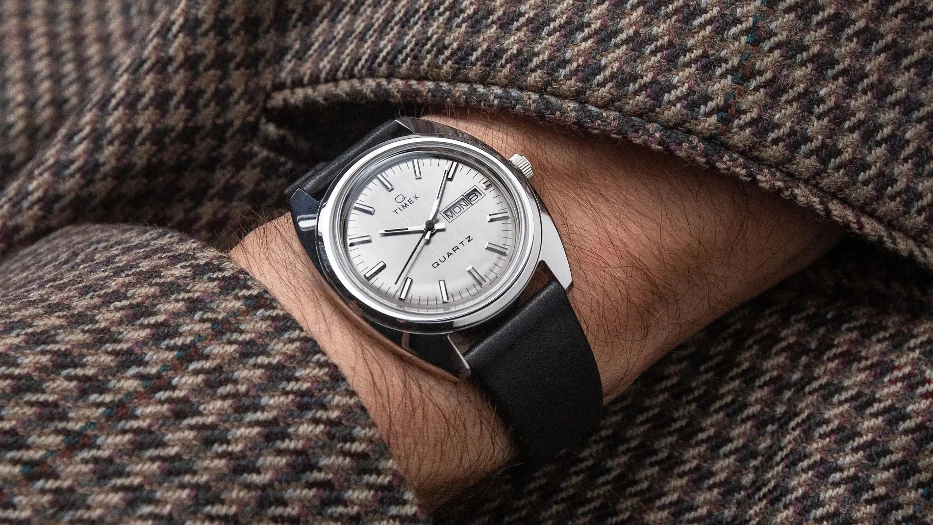 q timex on wrist