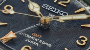 close up of the textured black dial on a seiko SPB493J alpinist gmt watch