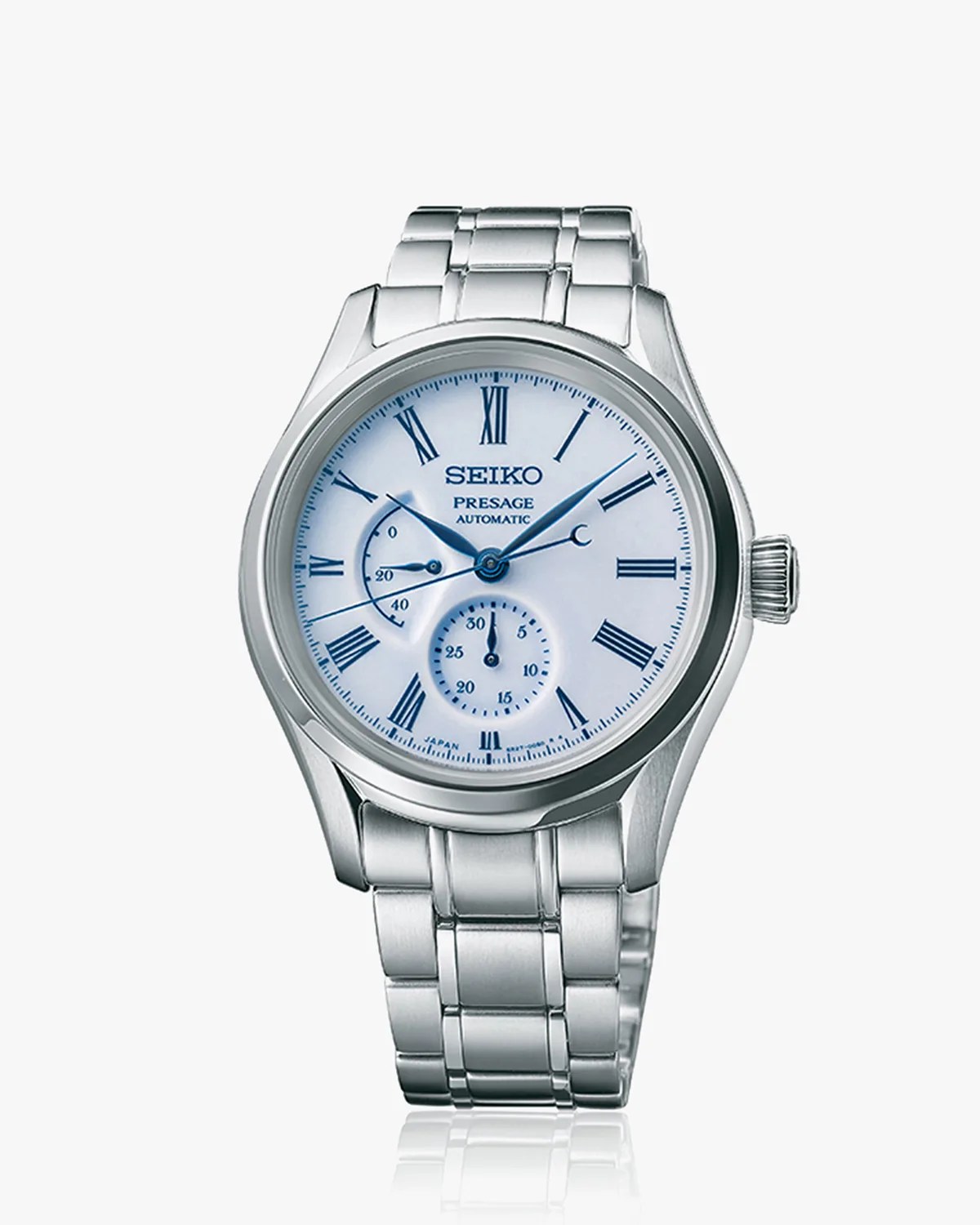 a steel seiko watch with a blue dial and roman numeral indices