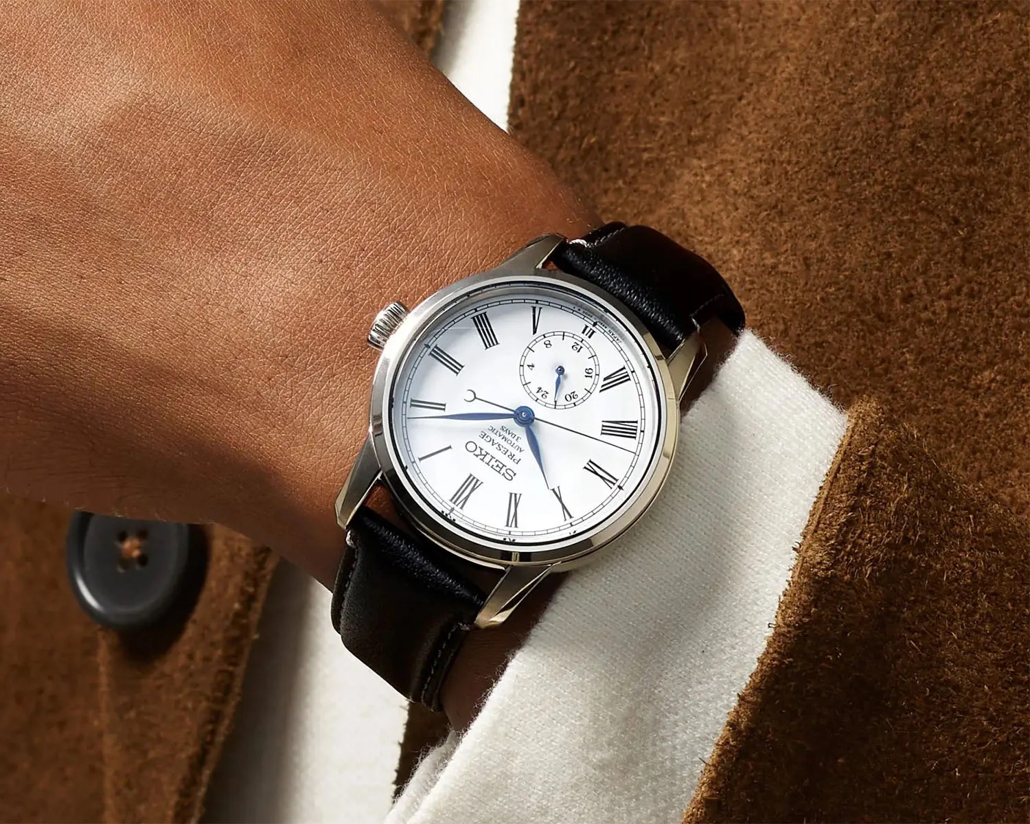 a seiko presage watch on a man's wrist