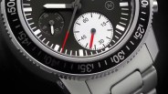 close up of the chronometer dial on a steel dive watch