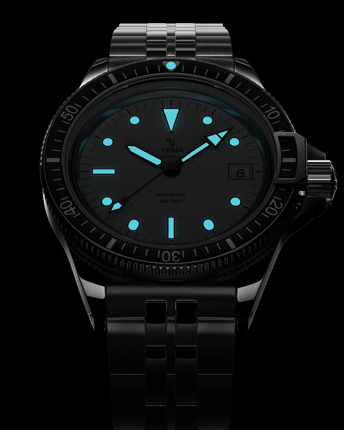 a dive watch in the dark with the lume indexes and hands visible