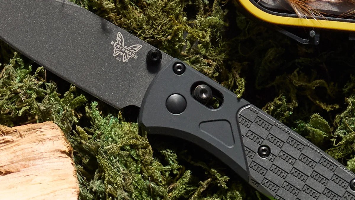 Closeup of Benchmade x Kith Bugout Knife on turf