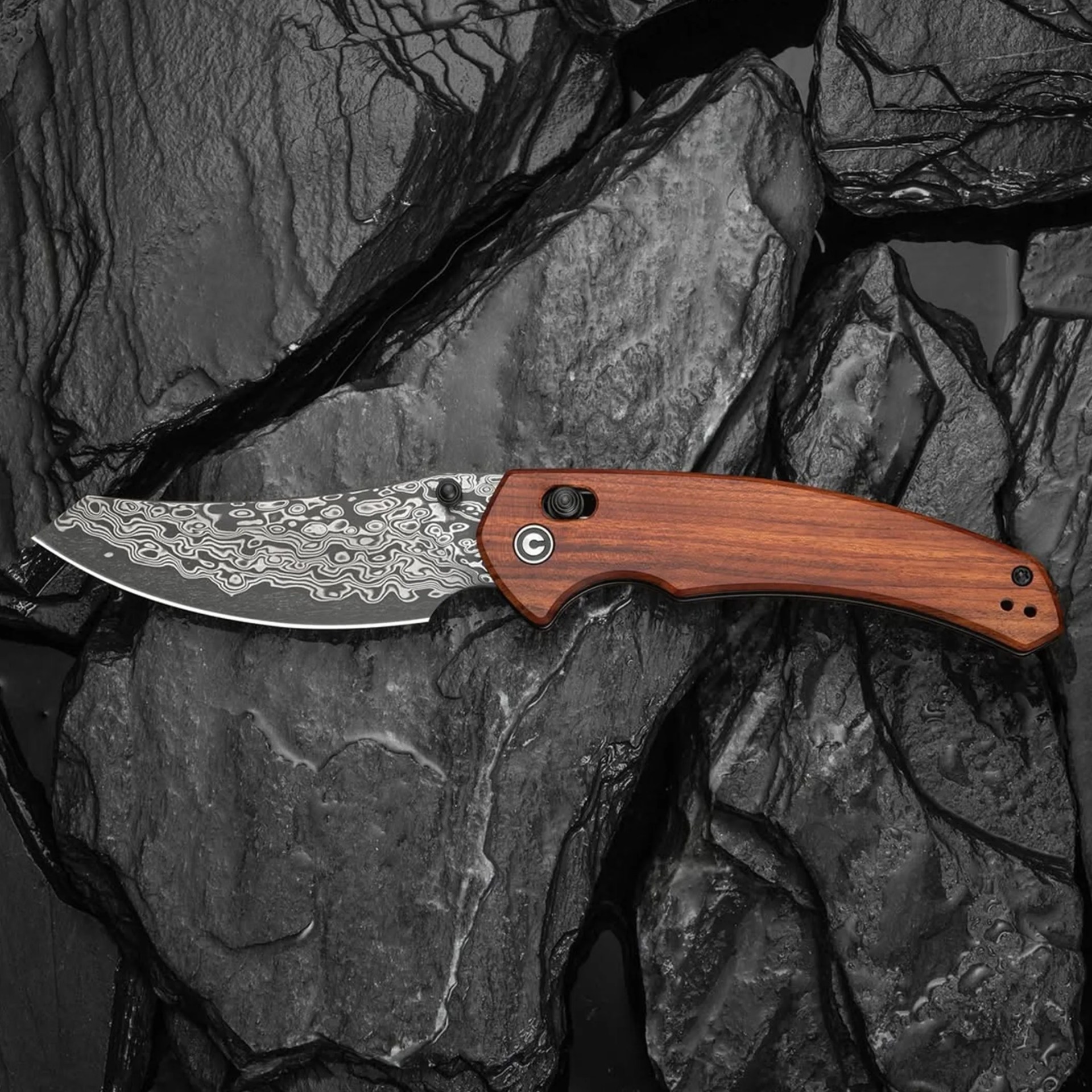 Civivi Sixgill on obsidian background