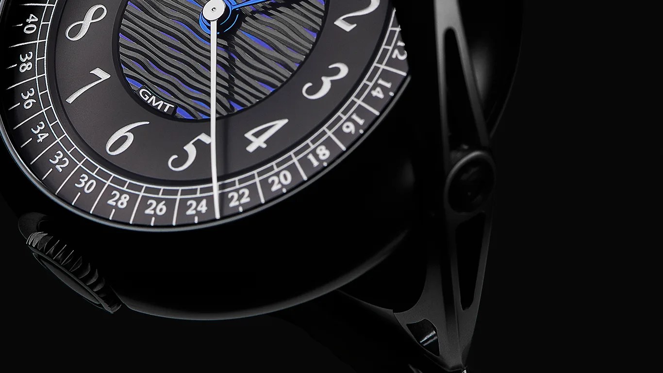 a closeup of a de bethune gmt watch