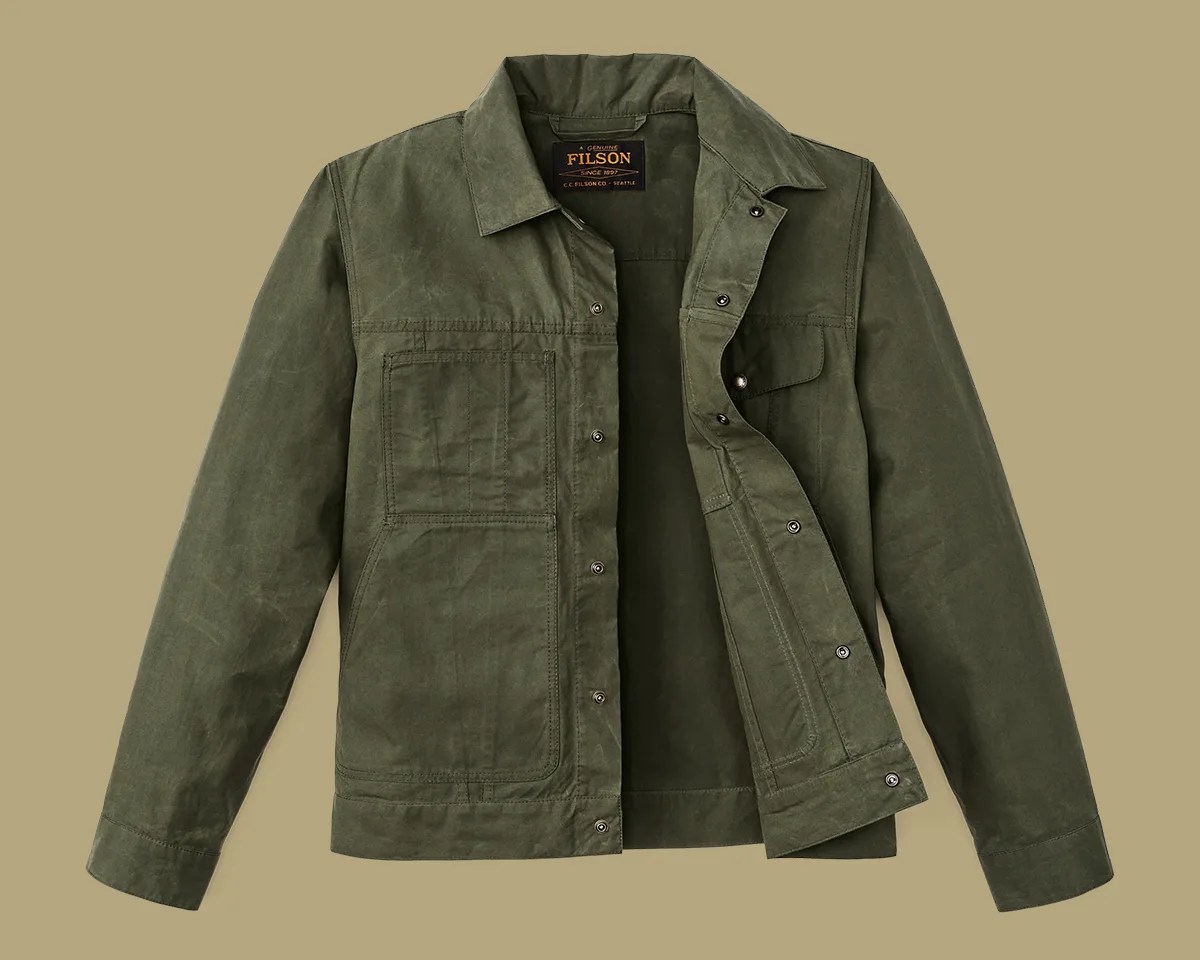 Filson Ranger Short Cruiser Jacket on tan background