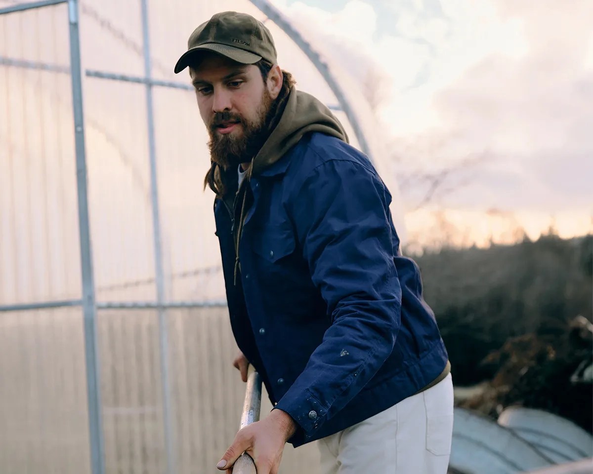 Filson Ranger Short Cruiser Jacket worn by farmer outdoors