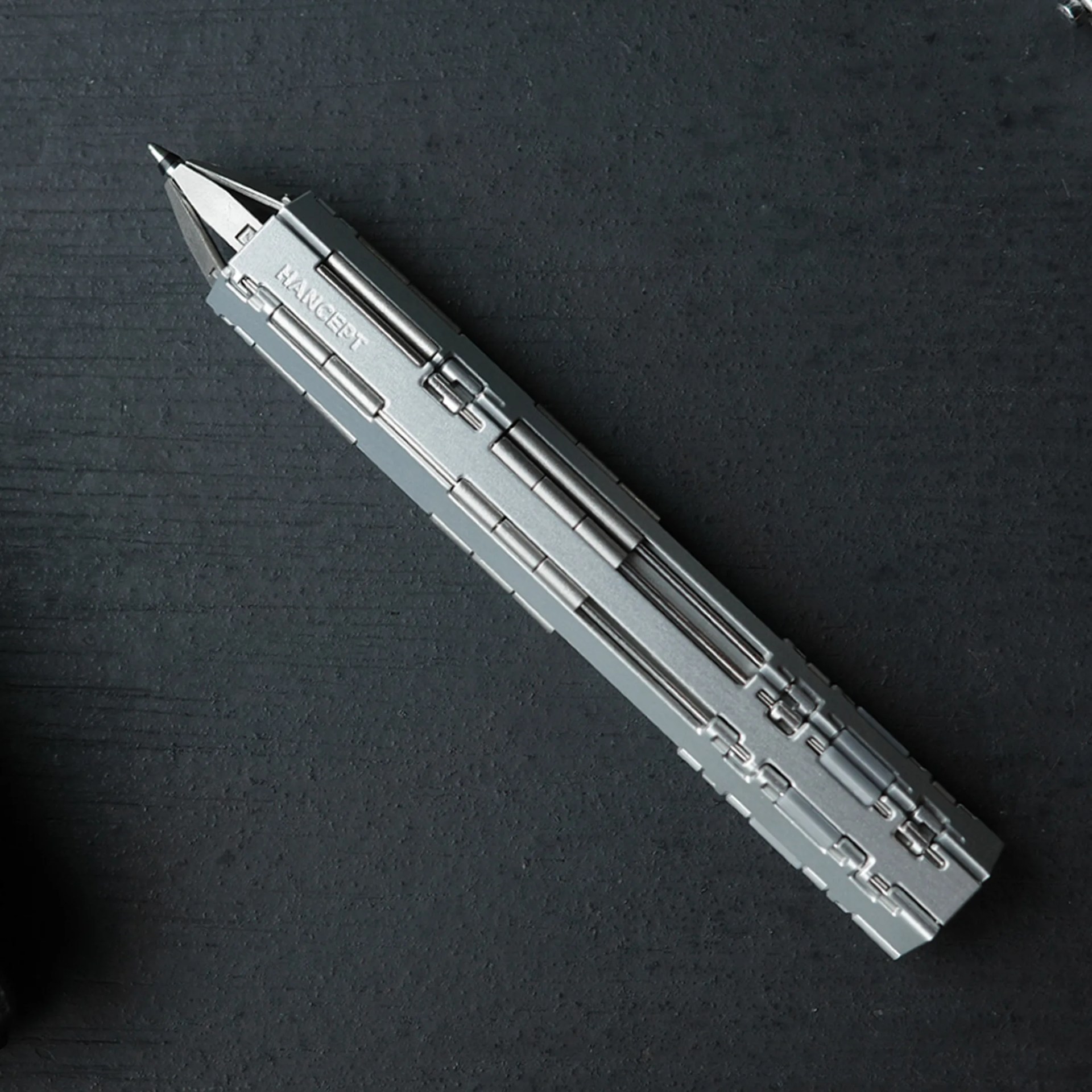 Hancept Zero Mk2 EDC Pen on black background