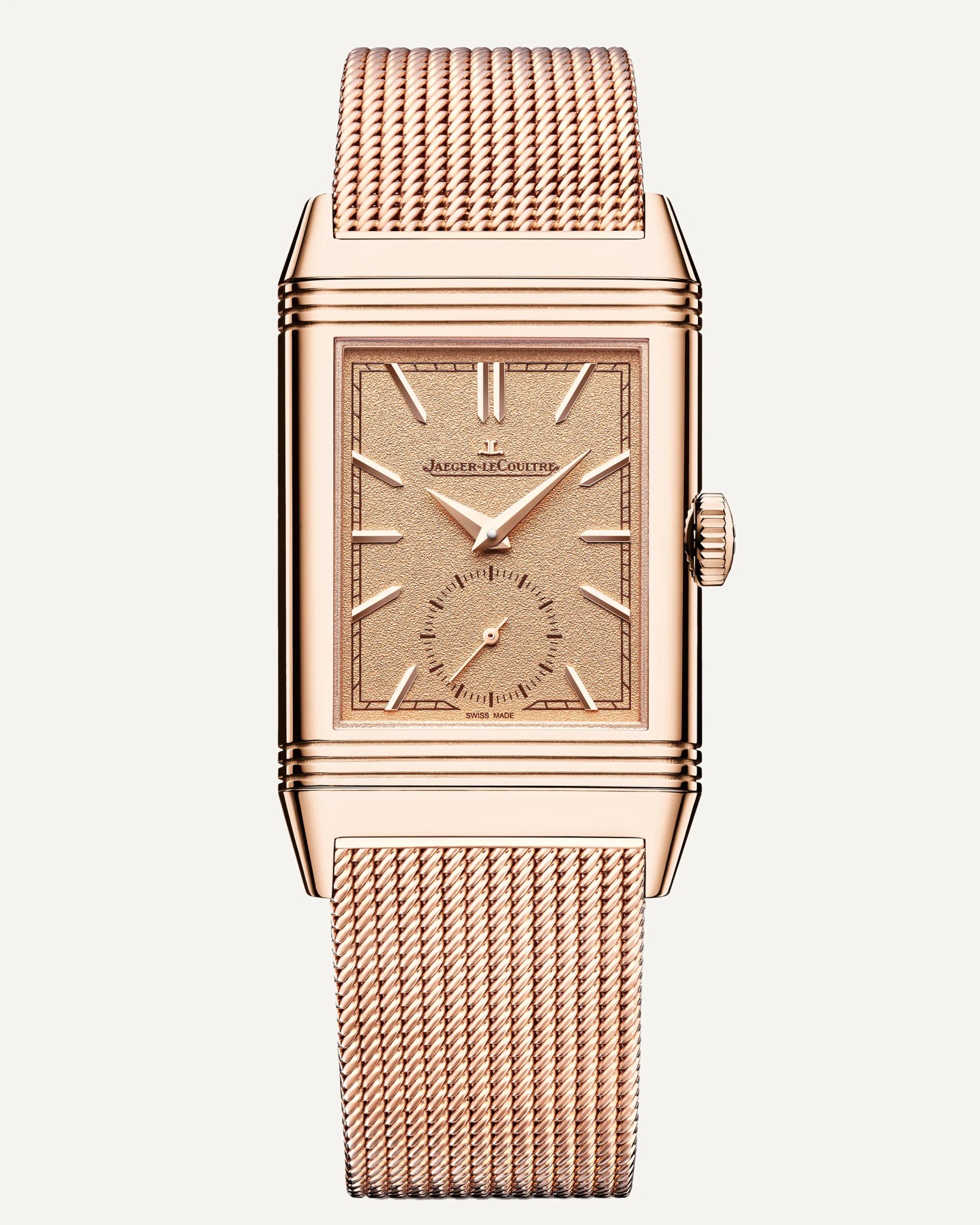 a gold rectangular watch