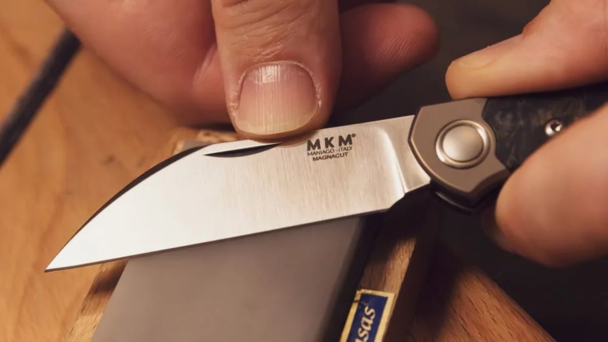 MKM Jaques knife blade being sharpened closeup