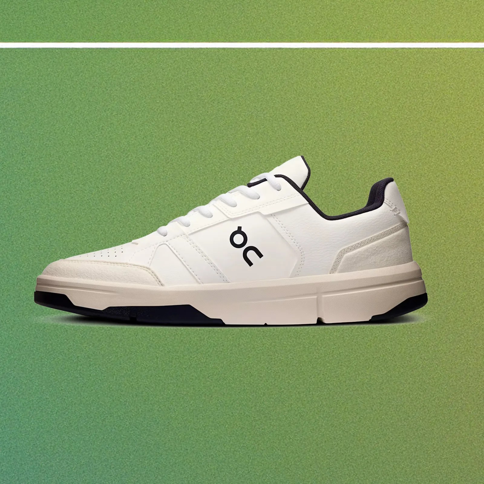 A single On THE ROGER Clubhouse revised sneaker = in white and black shown in profile against a gradient green background that looks like a tennis court.