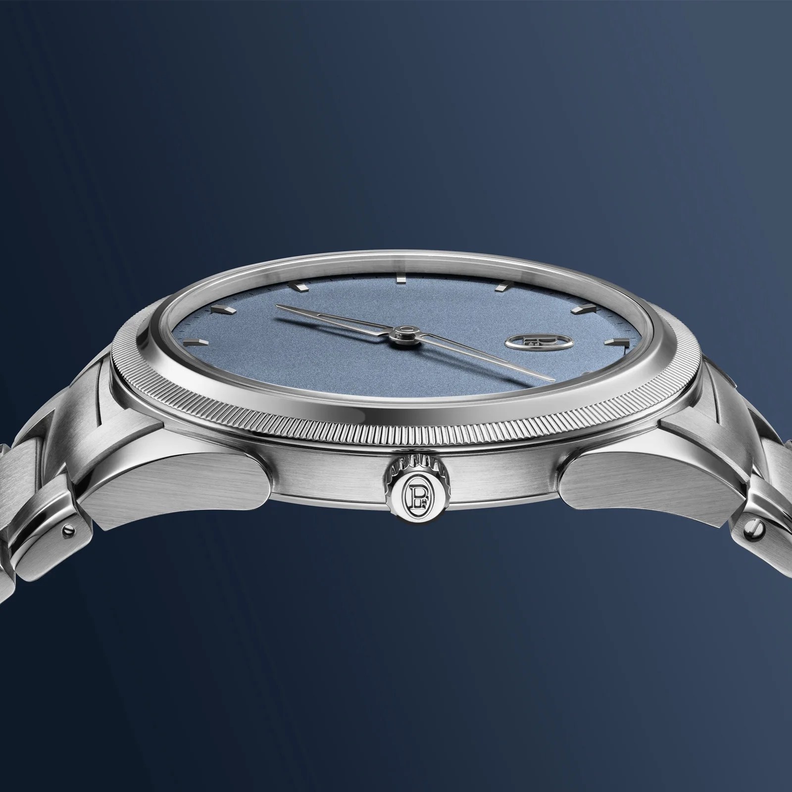 A view of the blue dial of the Parmigiani PF Micro-Rotor Platinum Stone Blue is shown from the edge to reveal the depth and texture of the dial elements. The watch is shown against a blue gradient background.