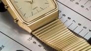 Closeup of Q Timex 1982 Ana Digi Reissue watch on audio console