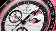 A close up of the dial of the MoonSwatch Mission to the Pink Moonphase