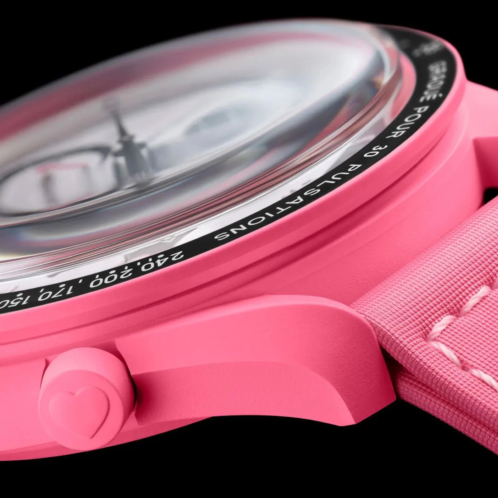 A close up of the side case of the MoonSwatch Mission to the Pink Moonphase against a dark black background.