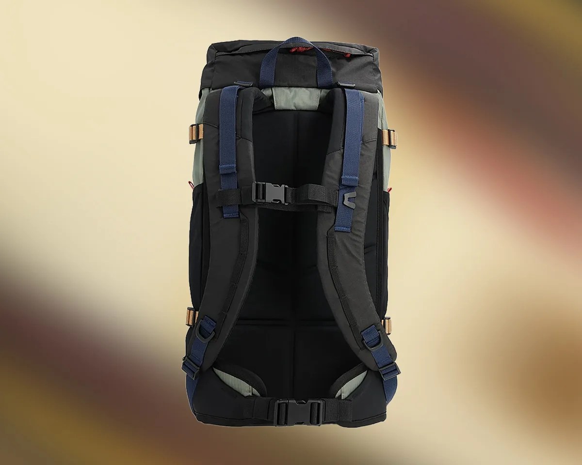 Topo Designs Rover Trail Pack 22L on blurry background