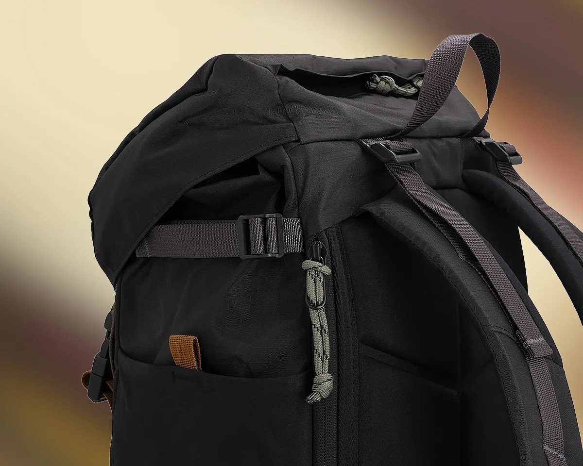 Closeup of Topo Designs Rover Trail Pack 22L on blurry background