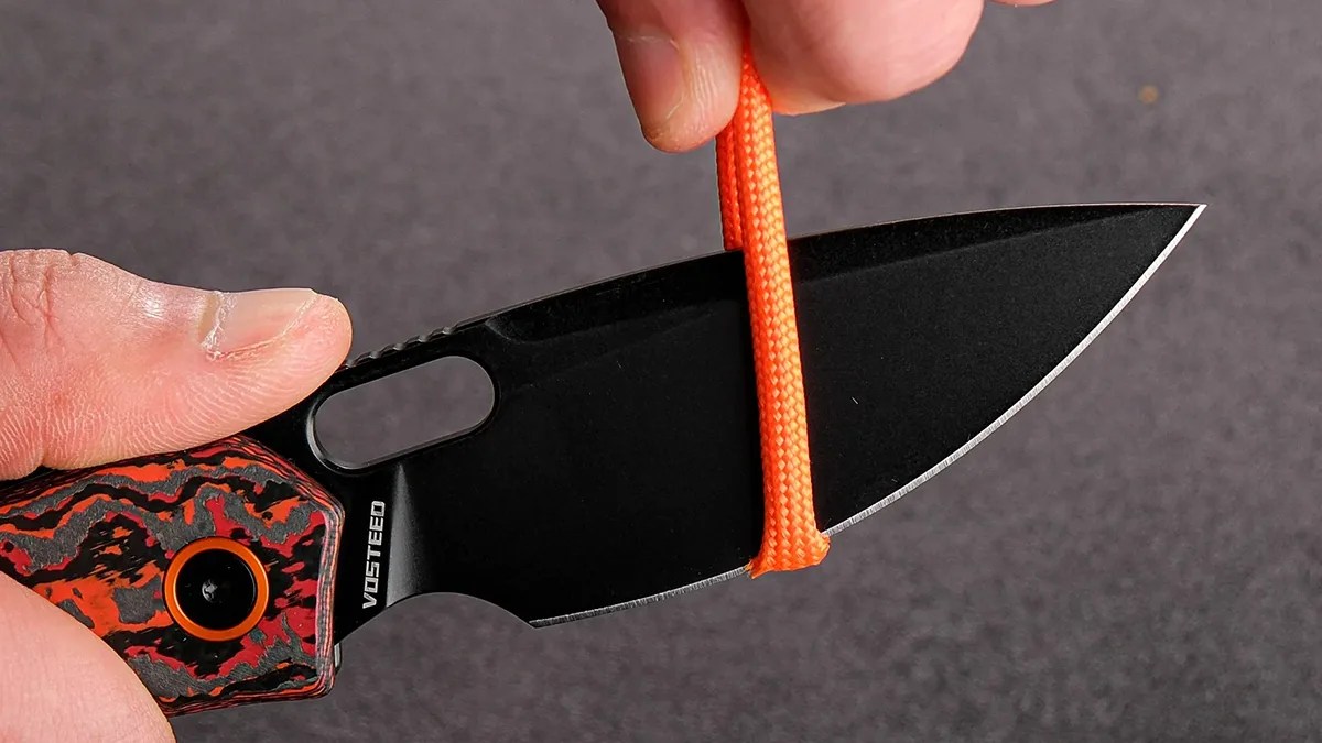 Vosteed Psyop Elmax knife cutting paracord closeup