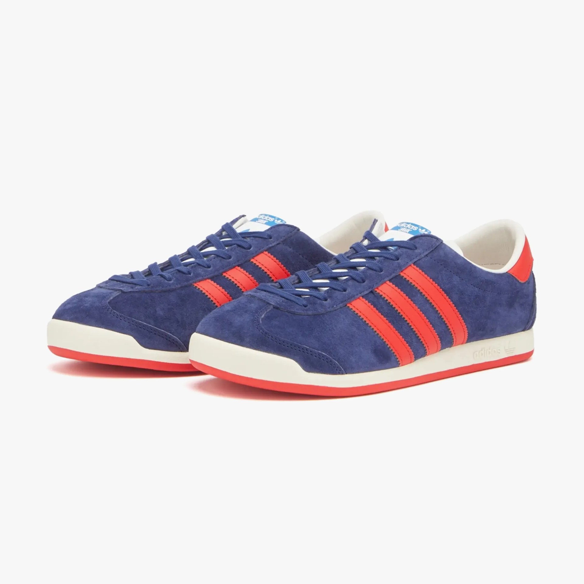 a pair of blue and red adidas sneakers