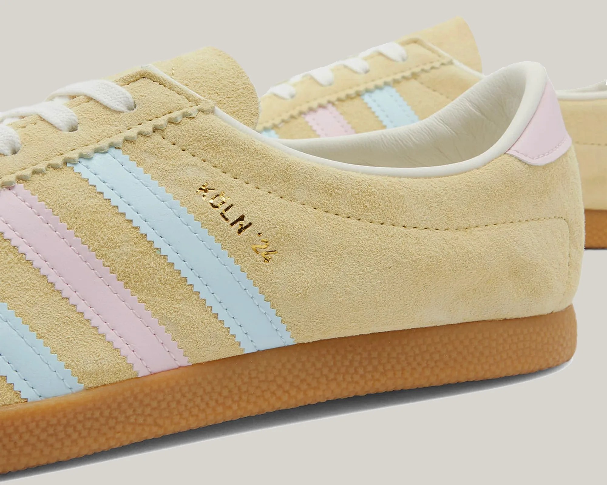 the side of a pair of adidas sneakers