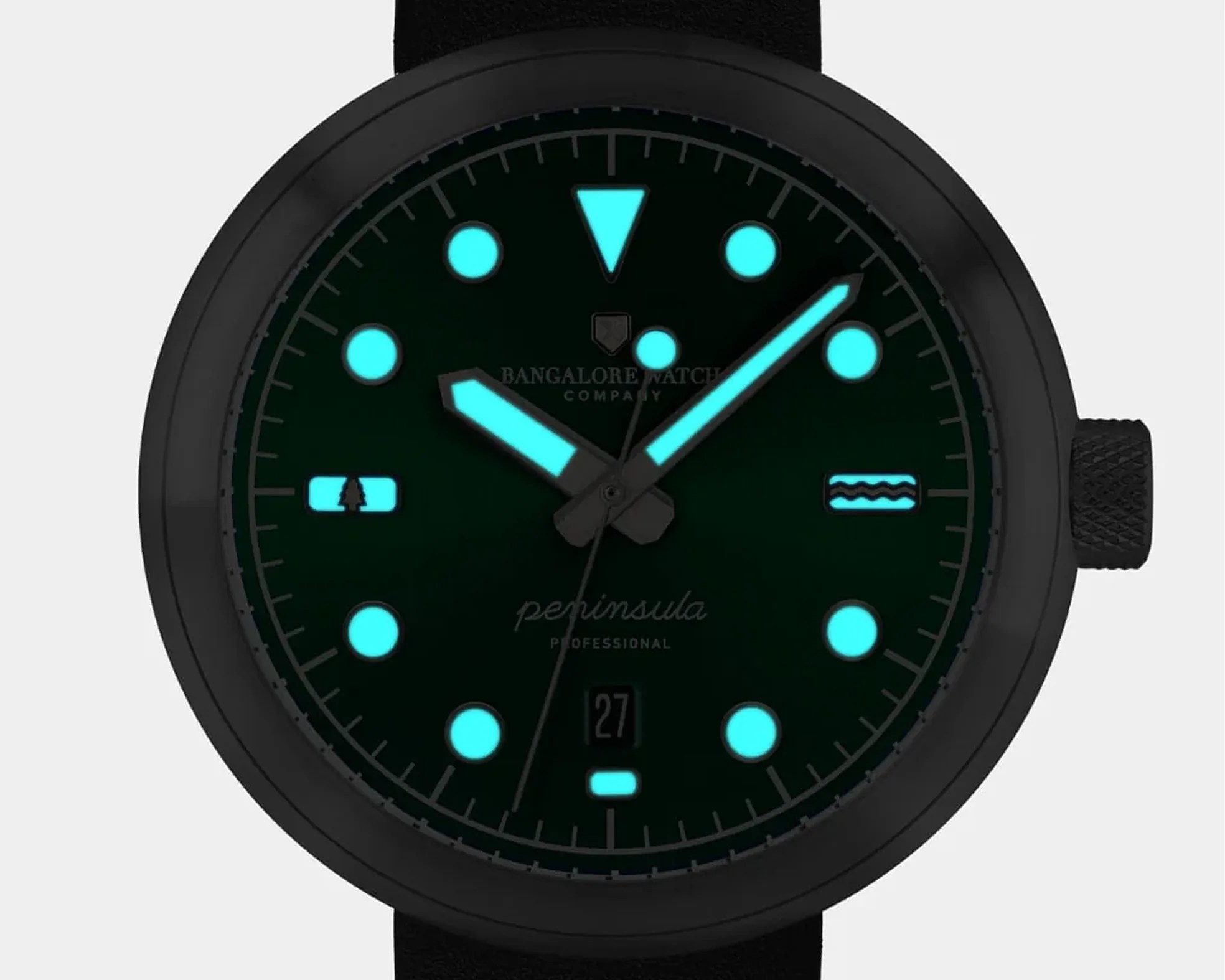 a field watch in the dark with lume hands and hour markers glowing